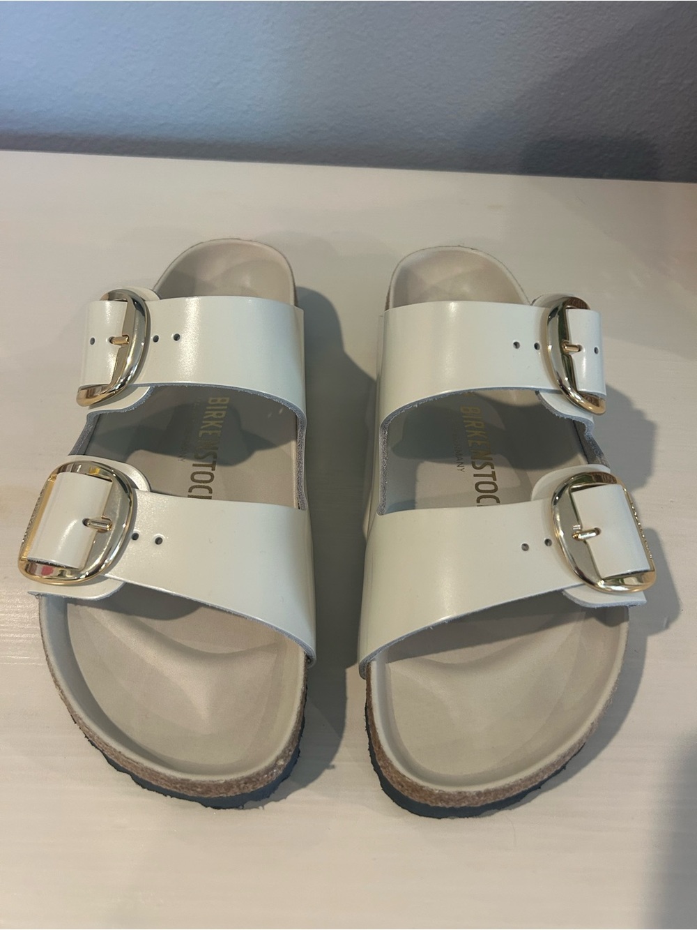 Birkenstock White Double-Buckle Arizona Sandals with Gold Buckles